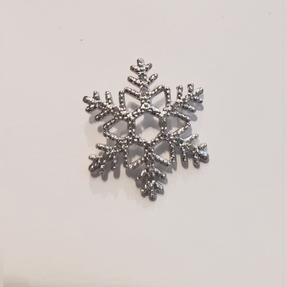 Diamond and sterling silver snowflake pendant